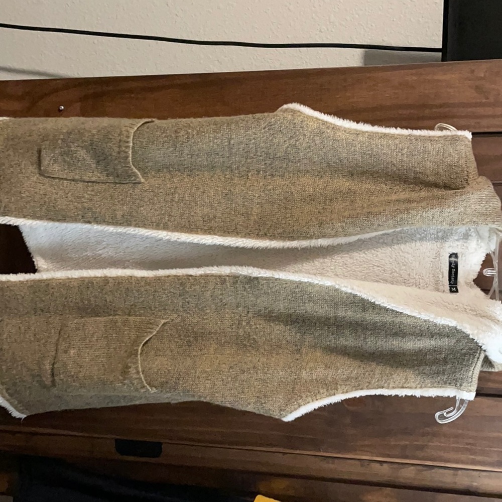 Supply society sleeveless vest